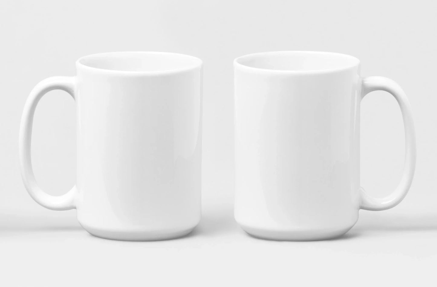 mockup-of-two-15-oz-coffee-mugs-positioned-side-by-side-28265